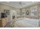 Serene main bedroom with a king bed, neutral tones, and natural light from the windows at 113B 13Th Ave. N, Surfside Beach, SC 29575