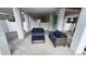 Relaxing covered patio area with comfortable wicker seating and coffee table, perfect for outdoor lounging at 113B 13Th Ave. N, Surfside Beach, SC 29575