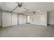 Spacious two car garage with concrete floor and white walls at 115 S Middleton Dr. Nw, Calabash, NC 28467