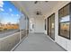 Covered screened porch with ceiling fans, offering outdoor living space at 115 S Middleton Dr. Nw, Calabash, NC 28467