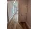 Bright hallway features durable floors and trim, lit by recessed lights and windows at 1241 Lady Bird Way, North Myrtle Beach, SC 29582