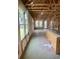 Unfinished home interior with exposed beams and framed windows ready for customization at 1241 Lady Bird Way, North Myrtle Beach, SC 29582
