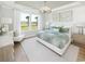 Serene main bedroom with a large window view, decorative accents, and ample natural light at 1241 Lady Bird Way, North Myrtle Beach, SC 29582