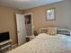 Inviting bedroom with a white metal bed frame and simple decor at 1261 Pineridge St., Conway, SC 29527