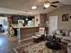 Open-concept living space with a seamless flow between the living area and modern kitchen at 1261 Pineridge St., Conway, SC 29527