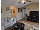 Cozy living room showcasing a comfortable couch, elegant decor, and wood laminate flooring at 1261 Pineridge St., Conway, SC 29527