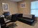 Functional home office space with a comfortable futon and bright natural light at 1261 Pineridge St., Conway, SC 29527