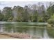 Scenic pond with lush trees along the banks at 1261 Pineridge St., Conway, SC 29527