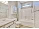 Bright bathroom with a tub and shower combination and vanity with decorative cabinet at 1294 River Oaks Dr. # 6E, Myrtle Beach, SC 29579