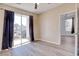 Bedroom featuring sliding glass doors, hardwood floors and modern fixtures at 1294 River Oaks Dr. # 6E, Myrtle Beach, SC 29579