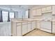 Functional kitchen with plenty of counter space and a breakfast bar at 1294 River Oaks Dr. # 6E, Myrtle Beach, SC 29579