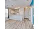 Bright living room showcasing modern flooring and open floor plan to the kitchen at 1294 River Oaks Dr. # 6E, Myrtle Beach, SC 29579