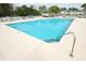 Community pool with stainless steel ladder and 3 ft depth markings at 1294 River Oaks Dr. # 6E, Myrtle Beach, SC 29579