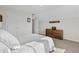 Cozy bedroom features a neutral palette, carpeted floor, double door closet, and wooden dresser at 136 Starlit Way, Myrtle Beach, SC 29579