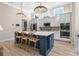 A modern kitchen with a large island, stainless steel appliances, and plenty of counter space at 136 Starlit Way, Myrtle Beach, SC 29579