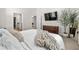 Comfortable main bedroom featuring soft textures, modern decor, and a relaxing ambiance, perfect for unwinding at 136 Starlit Way, Myrtle Beach, SC 29579