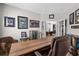 Well-decorated office with a large wood desk, leather chair, and an adjacent sitting area at 136 Starlit Way, Myrtle Beach, SC 29579