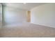 Large bedroom featuring soft carpet, neutral walls, and ample space at 1369 Palm Springs Paloma Dr, Longs, SC 29568