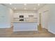 A modern kitchen featuring granite countertops, stainless steel appliances, and white cabinets at 1369 Palm Springs Paloma Dr, Longs, SC 29568