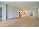 A spacious living room with modern lighting and an open floor plan at 1369 Palm Springs Paloma Dr, Longs, SC 29568