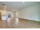 A well-lit living room that connects to the kitchen and other areas at 1369 Palm Springs Paloma Dr, Longs, SC 29568