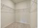 A walk-in closet with wire shelving, providing ample storage space at 1369 Palm Springs Paloma Dr, Longs, SC 29568