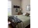 Bedroom with natural light from window and featuring hardwood floors and simple decor at 1372 Oakmont Ct., Murrells Inlet, SC 29576