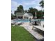 Inviting community pool featuring a poolside pavilion, lounge chairs, and dining sets at 1372 Oakmont Ct., Murrells Inlet, SC 29576