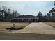 Charming single-story brick home with a covered porch and long driveway at 1375 Kenny Jordan Rd, Tabor City, NC 28463