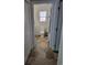 Bathroom leading in, featuring a toilet and a window within a bright, clean space at 1501 Ferney Dr., Conway, SC 29526