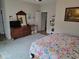 Spacious bedroom features a dresser, TV, and a view of the closet and bathroom at 1501 Ferney Dr., Conway, SC 29526