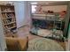 Comfortable bedroom featuring a bunk bed, bookshelf, and whimsical decor at 1501 Ferney Dr., Conway, SC 29526
