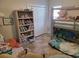 Charming bedroom featuring a bunk bed and lots of stuffed animals at 1501 Ferney Dr., Conway, SC 29526