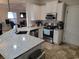 Well-equipped kitchen with granite countertops, stainless steel appliances, and ample cabinet space at 1501 Ferney Dr., Conway, SC 29526