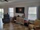 Living room with a large television at 1501 Ferney Dr., Conway, SC 29526