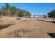 Distant view of a pond featuring a fountain among a residential neighborhood and blue skies at 1501 Ferney Dr., Conway, SC 29526