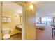 Connected bathroom and living area featuring granite vanity at 1501 S Ocean Blvd. # 1131, Myrtle Beach, SC 29577