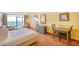 Relaxing bedroom featuring a balcony with ocean views, a full bed, and a compact dining area at 1501 S Ocean Blvd. # 1131, Myrtle Beach, SC 29577