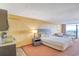 Comfortable living space features balcony access and kitchenette at 1501 S Ocean Blvd. # 1131, Myrtle Beach, SC 29577