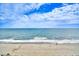 Scenic ocean view with gentle waves lapping the shoreline beneath a beautiful sky at 1501 S Ocean Blvd. # 1131, Myrtle Beach, SC 29577