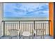 Relaxing balcony view with seating overlooking the beach and ocean at 1501 S Ocean Blvd. # 844, Myrtle Beach, SC 29577