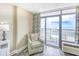Comfortable armchair by balcony doors that lead to ocean views at 1501 S Ocean Blvd. # 844, Myrtle Beach, SC 29577