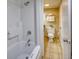 A view of the shower and the commode, with tiled floors, and a towel rack at 1501 S Ocean Blvd. # 844, Myrtle Beach, SC 29577