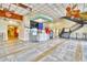 Spacious lobby area with high ceilings, tiled floors, and a convenient cafe at 1501 S Ocean Blvd. # 844, Myrtle Beach, SC 29577