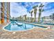 Inviting pool area featuring clear blue water and beautiful landscaping at 1501 S Ocean Blvd. # 844, Myrtle Beach, SC 29577