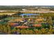 Aerial view of multiple baseball fields with a pond nearby, offering recreational opportunities at 1509 Seachase Way, North Myrtle Beach, SC 29582