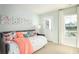 Relaxing bedroom with a daybed, decorative pillows, and natural light streaming through the windows at 1509 Seachase Way, North Myrtle Beach, SC 29582