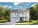 Charming two-story home boasts a double garage, a covered front porch and a second-story balcony with beautiful curb appeal at 1509 Seachase Way, North Myrtle Beach, SC 29582