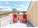 Balcony with chairs providing scenic views of the town and coastline at 1614-B S Ocean Blvd., Surfside Beach, SC 29575