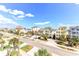 Street view of colorful houses, palm trees and a clear blue sky at 1614-B S Ocean Blvd., Surfside Beach, SC 29575